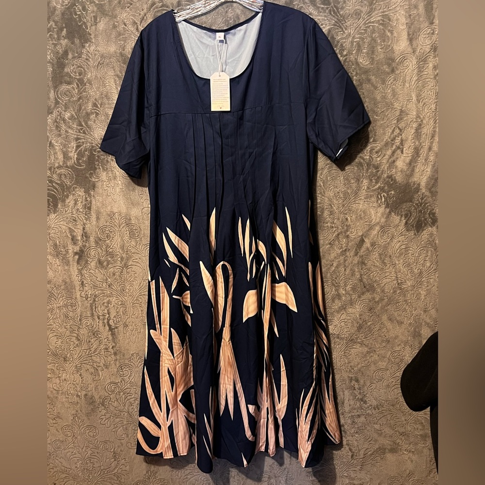 Made with love silky blue dress size extra large never been used with tags